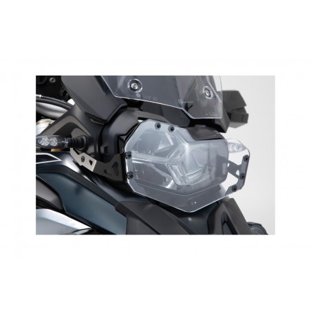 headlight protection bracket with bezel